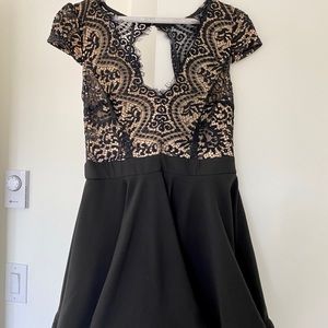 Black swing dress with eyelash lace